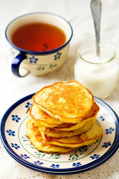 Pumpkin pancakes with berry sauce