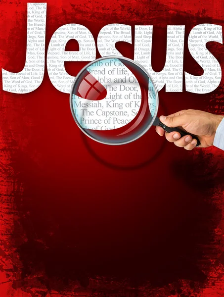 The name JESUS under observation with magnifying glass