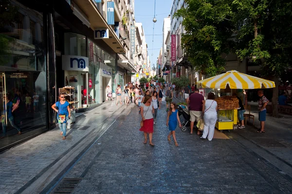 ATHENS-AUGUST 22: Shopping on Ermou Street with crowd of people on August 22, 2014 in Athens, Greece. Ermou street is a main shopping street in Athens.
