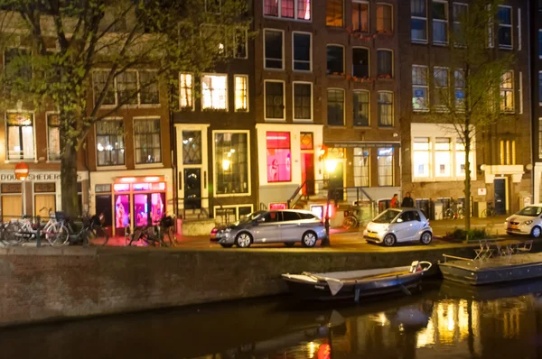 Red light district and canals at night.
