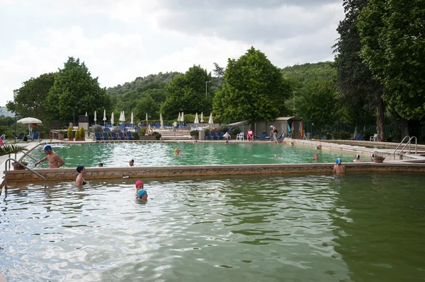 Tourists enjoy thermal baths