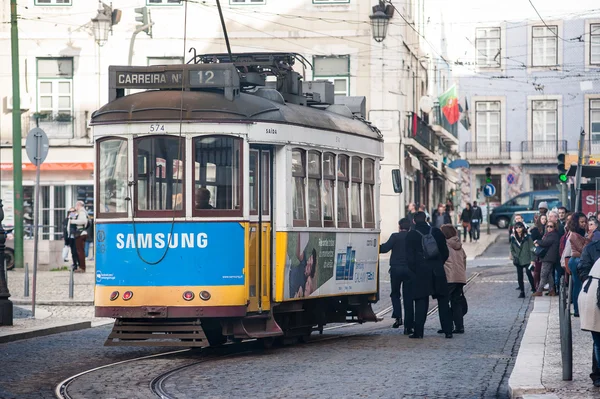 Traditional yellow tram in Lisbon City.