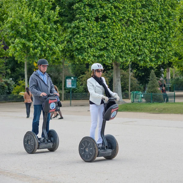 Tourists visiting the city near the Eiffel Tower