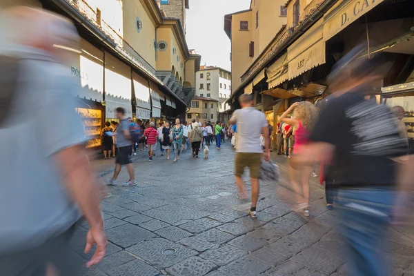 People walking on Ponte Vecchio