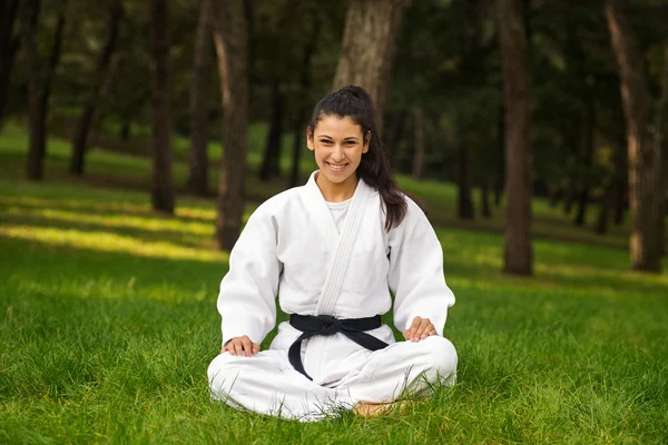 Young woman practicing judo portrait