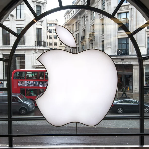 Apple logo displayed on window of Apple Store