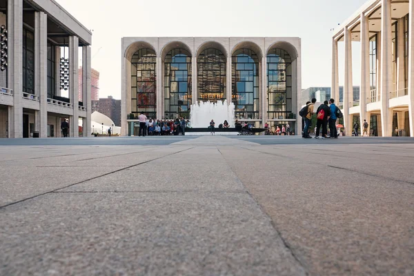 People in front of Lincoln Center building in New York