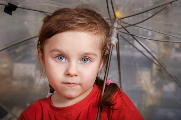 Little cute girl with umbrella