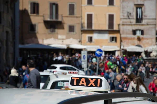 Taxi car sign in Rome, Italy