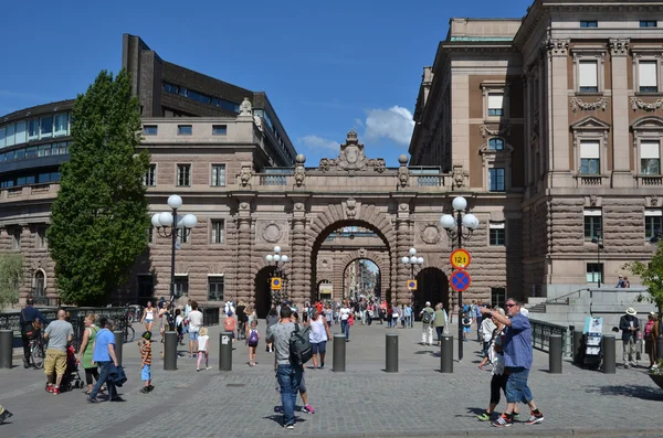 Tourists by the parliament house in Stockholm