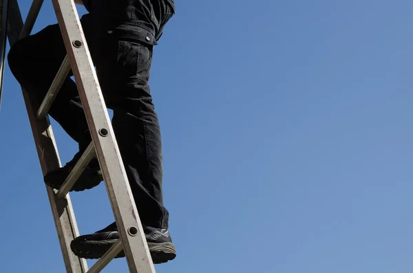 Man on a ladder
