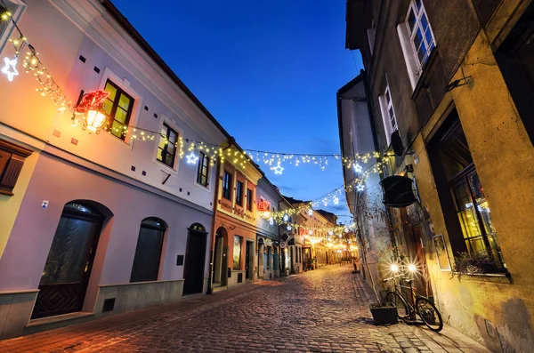 Vintage street decorated by Christmas lights in Bielsko-Biala