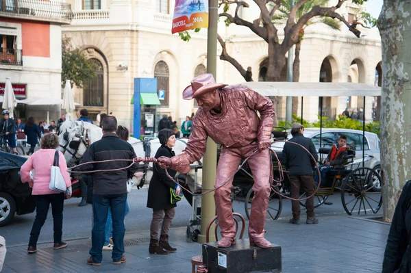 Street Performer imitating bronze statue