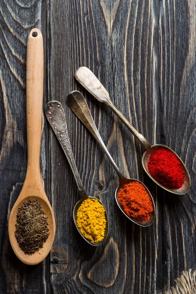 Spices over wooden background