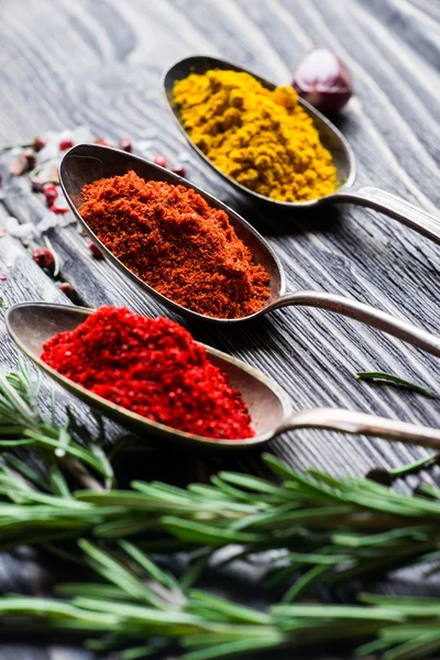 Spices over wooden background