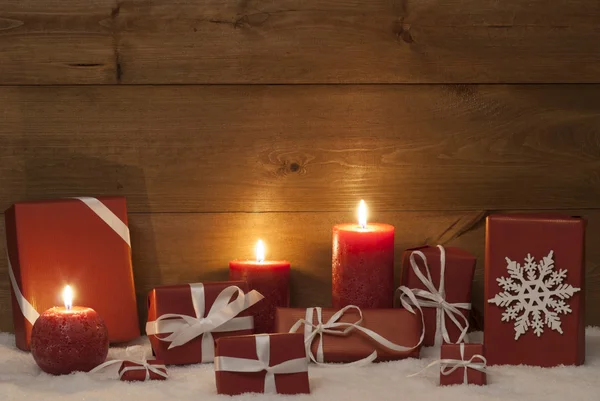 Christmas Decoration With Red Candles, Presents, Gifts And Snow