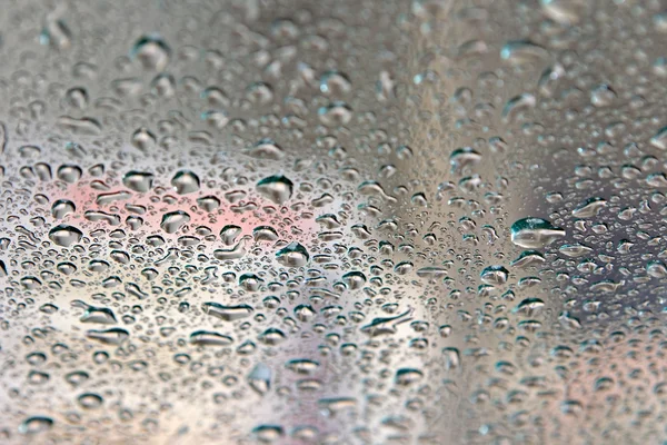 Water drops on car window in Car Wash, Netherlands