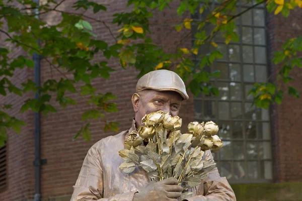 Arnhem, Netherlands - September 28, 2014: Portrait of a florist Living Statues World Championships.