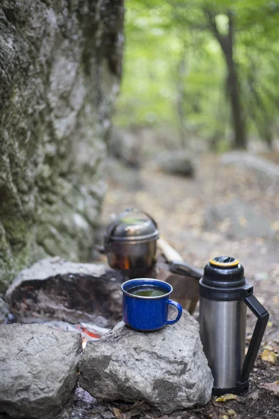 Cooking breakfast.Cooking breakfast on a campfire at a summer camp.