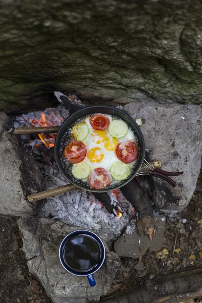 Cooking breakfast at the campsite.