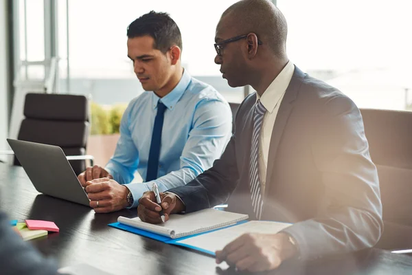 Two experienced business executives in a meeting