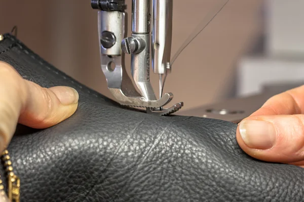 Hands on sewing machine