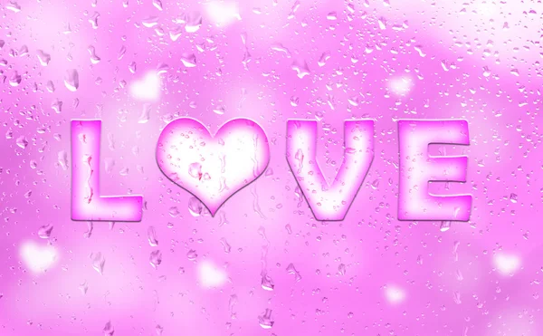 Pink color love letter on droplet window