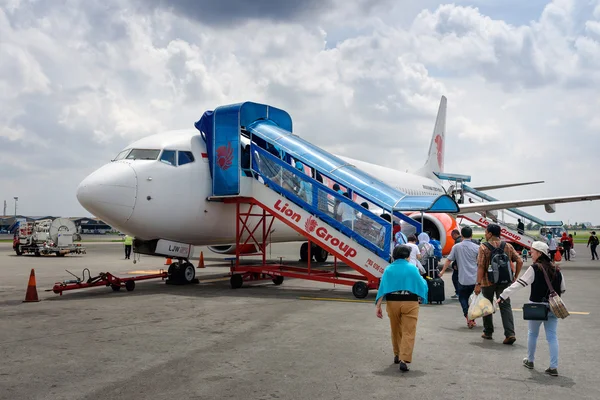 Passengers entering an Lion Air airplane at Soekarno-Hatta International Airport