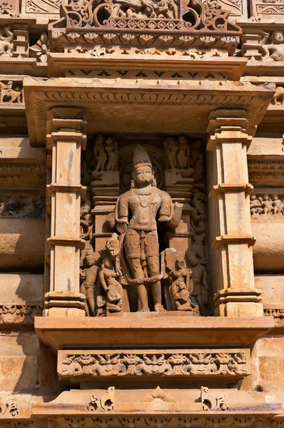 Stone carved sculpture of Male Deity on Lakshmana temple. Khajuraho