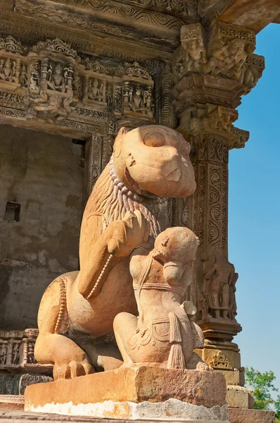 Sculpture of lion and woman. Khajuraho
