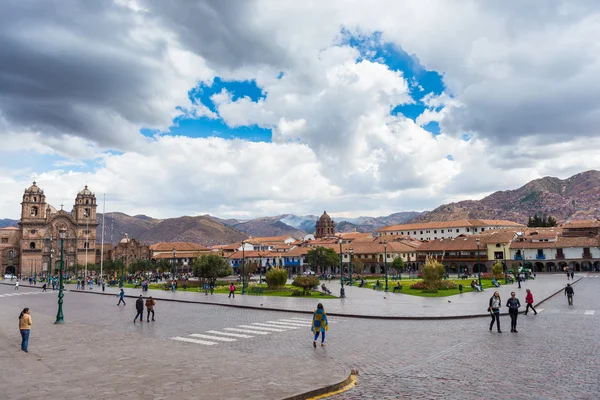 Cusco, Peru - September 3, 2015: Tourists and local people on main square, Plaza de Armas, in Cusco, Peru, former Inca capital, famous travel destination in Peru and one of the most visited historical