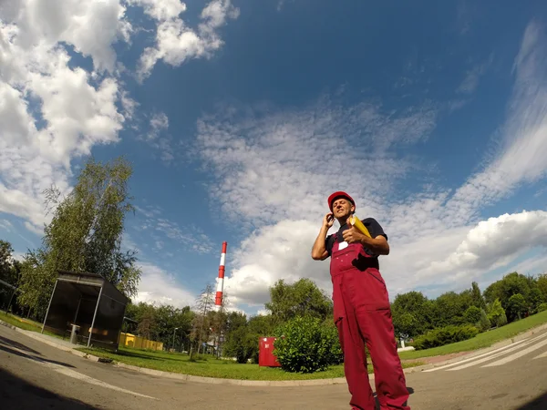 Industrial Worker With Red Hard Hat Showing Ok Sign