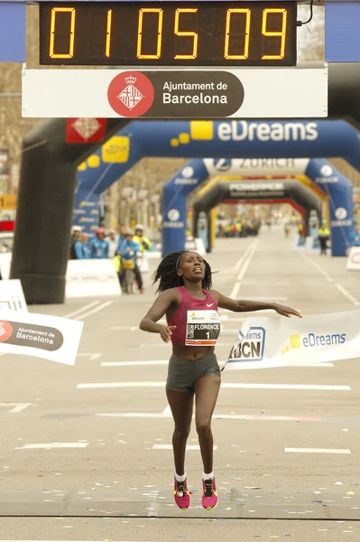 Florence Kiplagat breaking half marathon world record