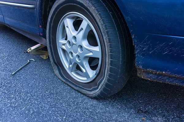 Flat tire on the road