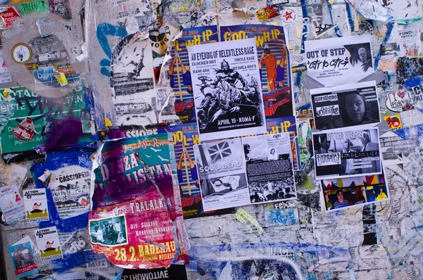 Wall with old torn posters