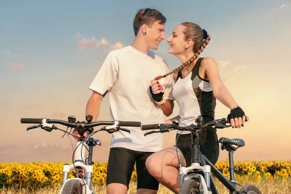 Happy couple  with sporty bicycles