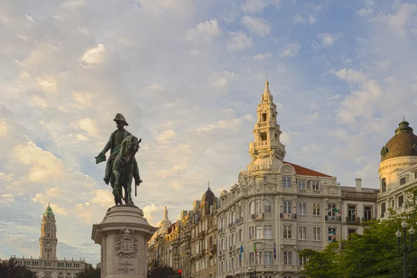 PORTO, PORTUGAL - JULY 04, 2015: Monument of King Pedro IV statue in foreground and city hall in the top of Aliados Avenue, on July 04, 2015 in Porto, Portugal.