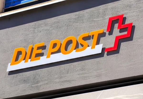 Swiss Post sign on the wall of the post office