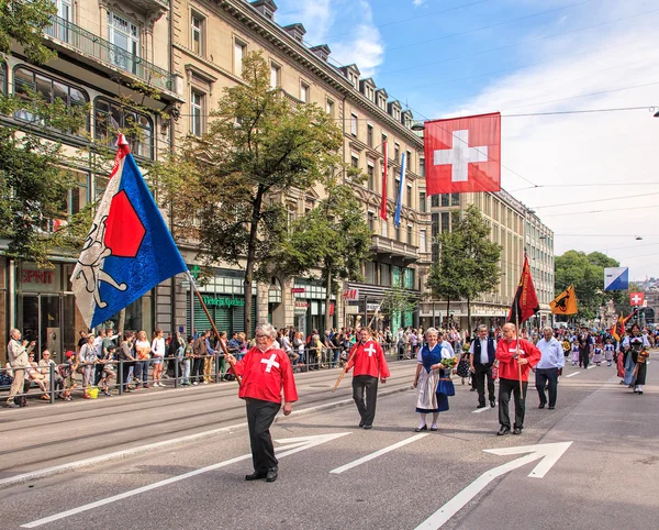 Participants of the parade devoted to the Swiss National Day