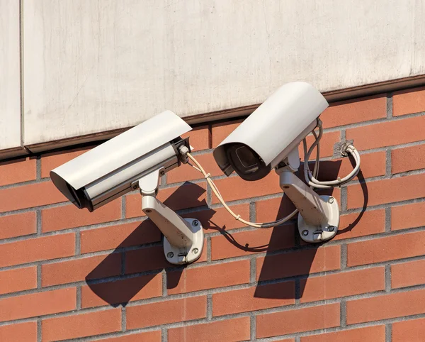 Security cameras on a building wall