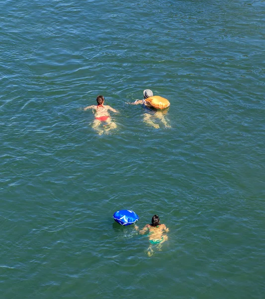 People swimming in the Rhine river