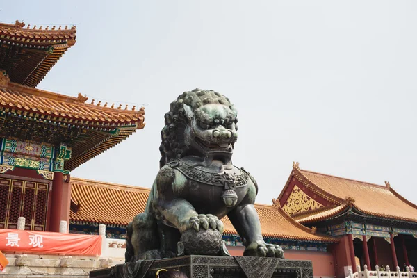 A statue of a lion-guard at Beijing Forbidden city - ancient res