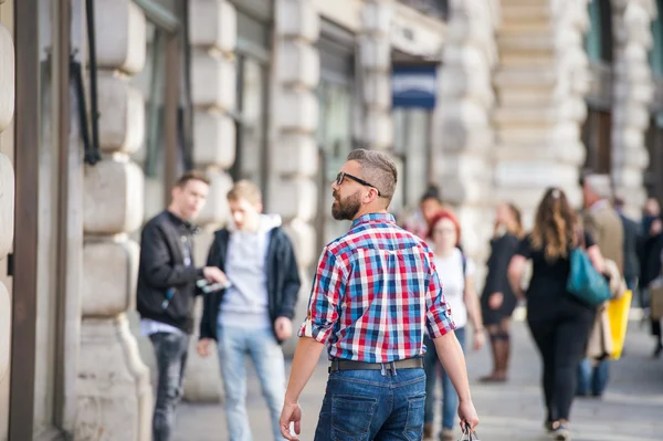 Hipster man shopping in London
