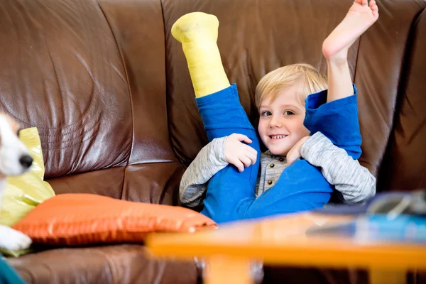 Boy with broken leg in cast