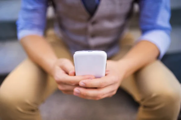 Businessman using smart phone