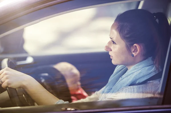 Mother and child in the car