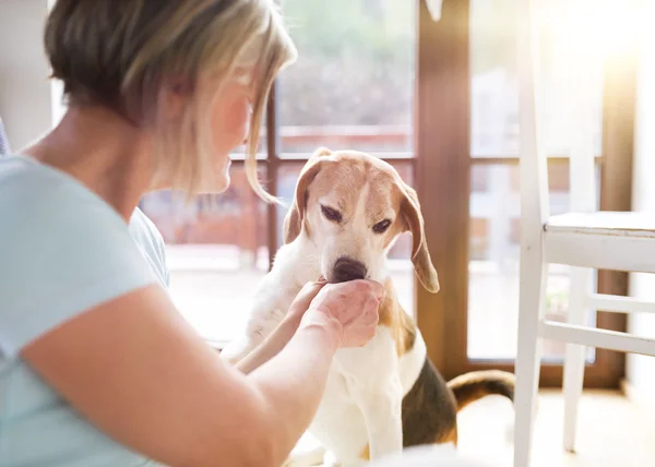 Senior woman and dog