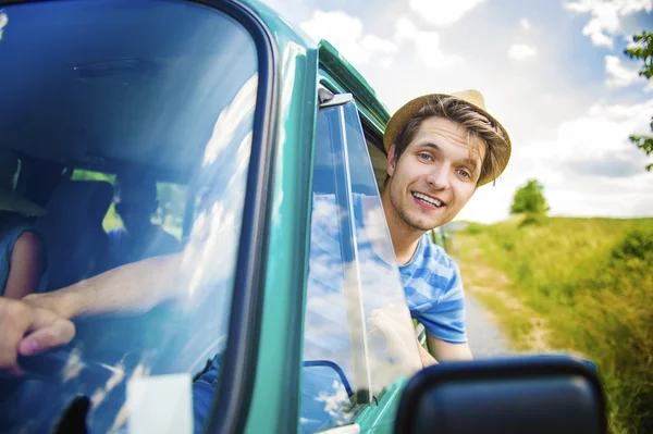 Young hipster friends on road trip