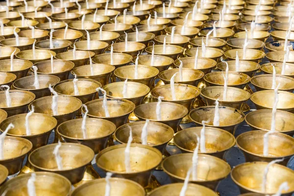 Many candles in a temple