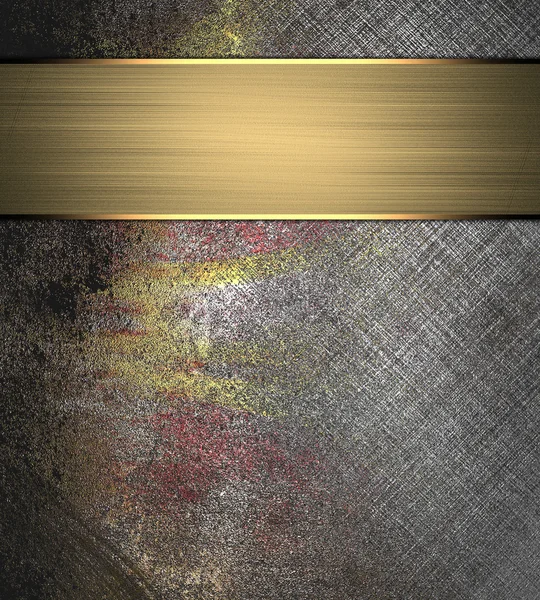 Old scratched metallic background with gold plate. Design template. Design site